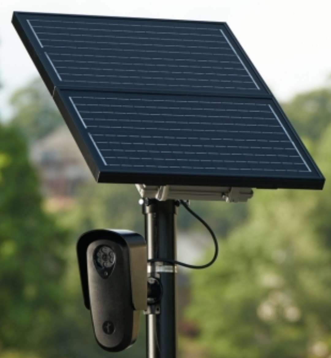 Flock brand camera and solar panel assembly on a pole